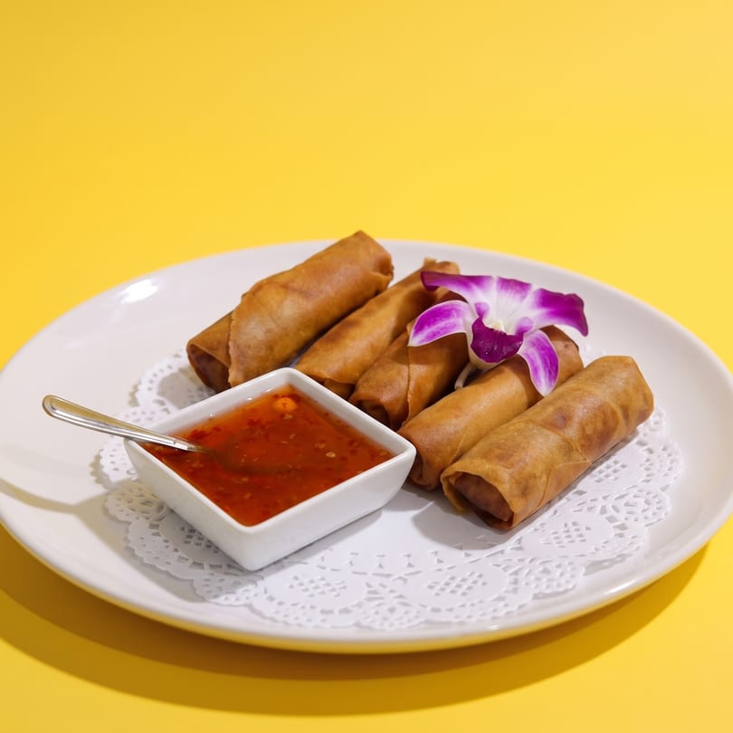 Crispy Thai spring rolls with sweet chili sauce